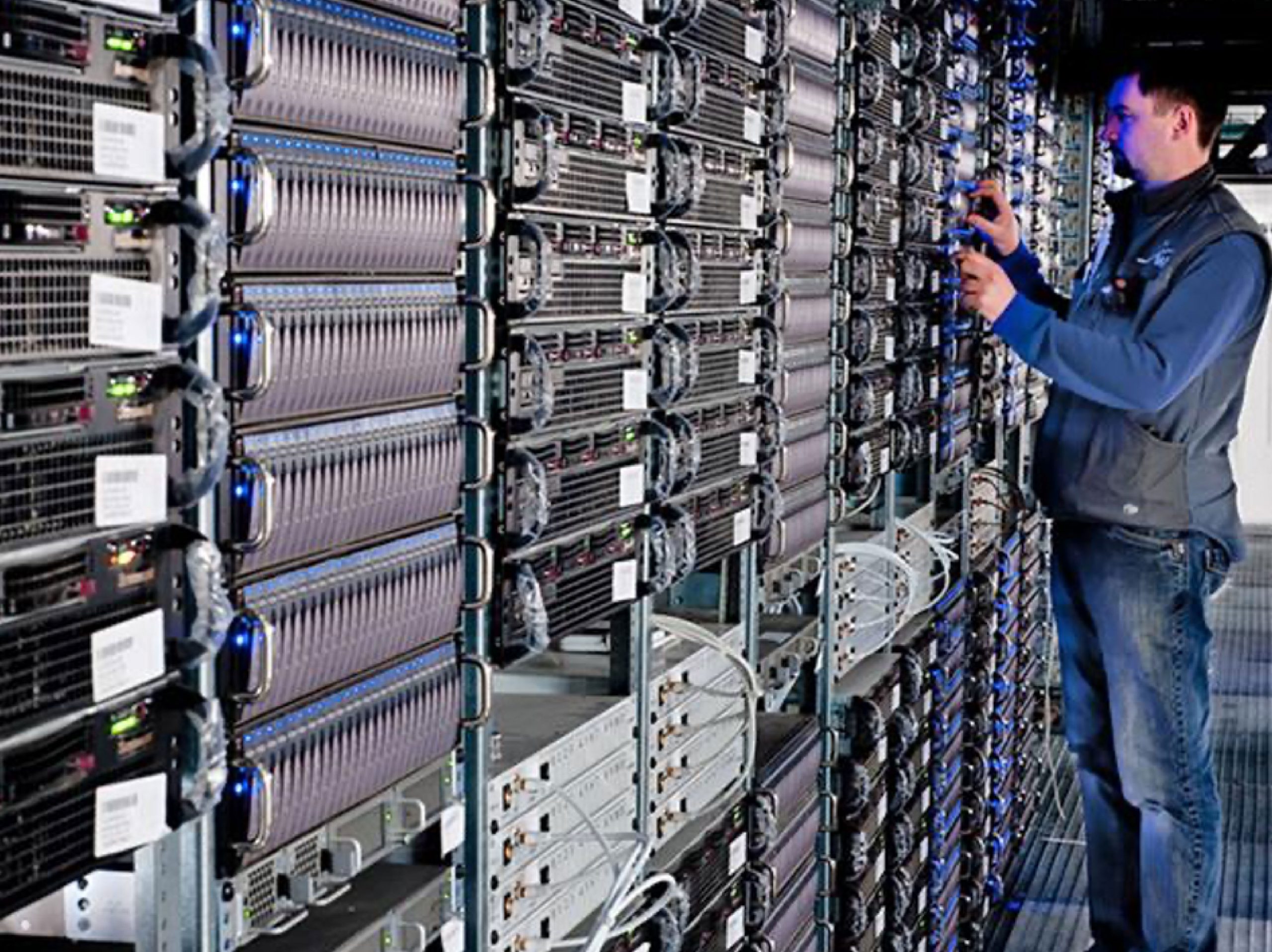 professional man standing in front of data cloud center